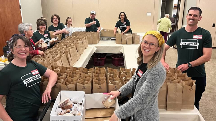 Minot * Meals on Wheels  logo