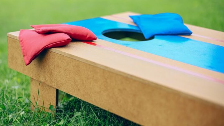 Men's Fellowship Cornhole Tournament logo