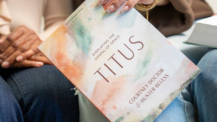 Titus - Courtney Doctor and Hunter Beless logo