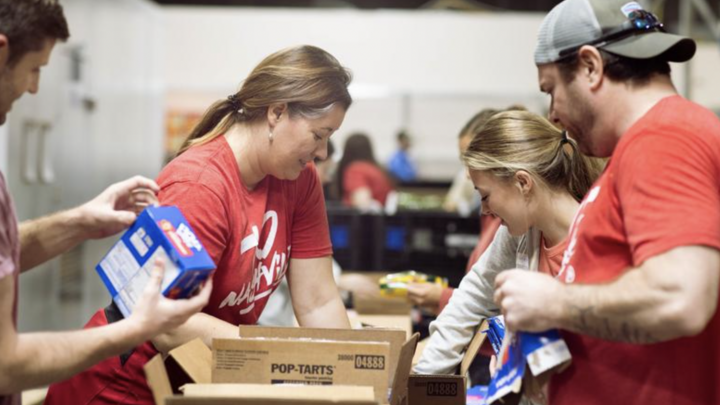 Packing Food Boxes at The Bridge Warehouse logo