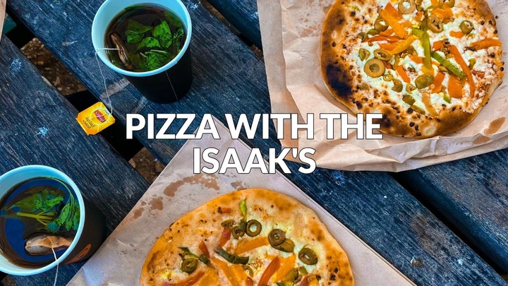Pizza with the Isaak's logo