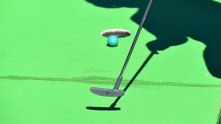 AMPED Mini Golf Outing logo